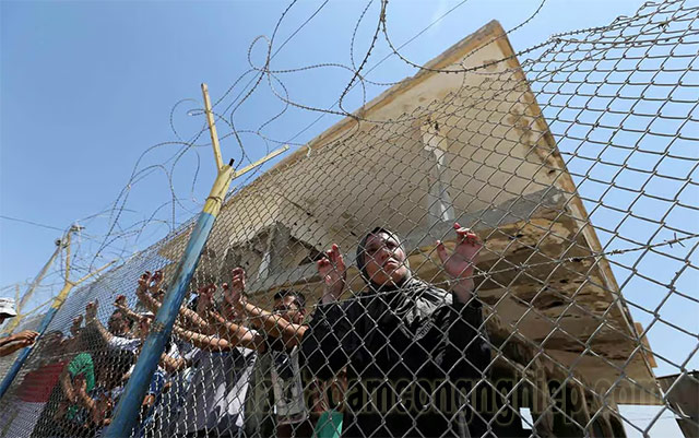 Người Palestine tụ tập ở cổng biên giới Rafah biểu tình cuộc chiến